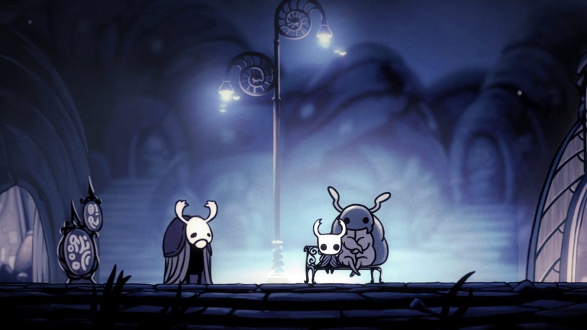 Ein Screenshot aus dem Spiel Hollow Knight, der Insekten-Charaktere unter einer Straßenlaterne zeigt