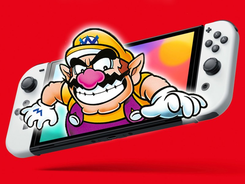 Ein Bild von einer Nintendo Switch aus der Wario hervorschaut.